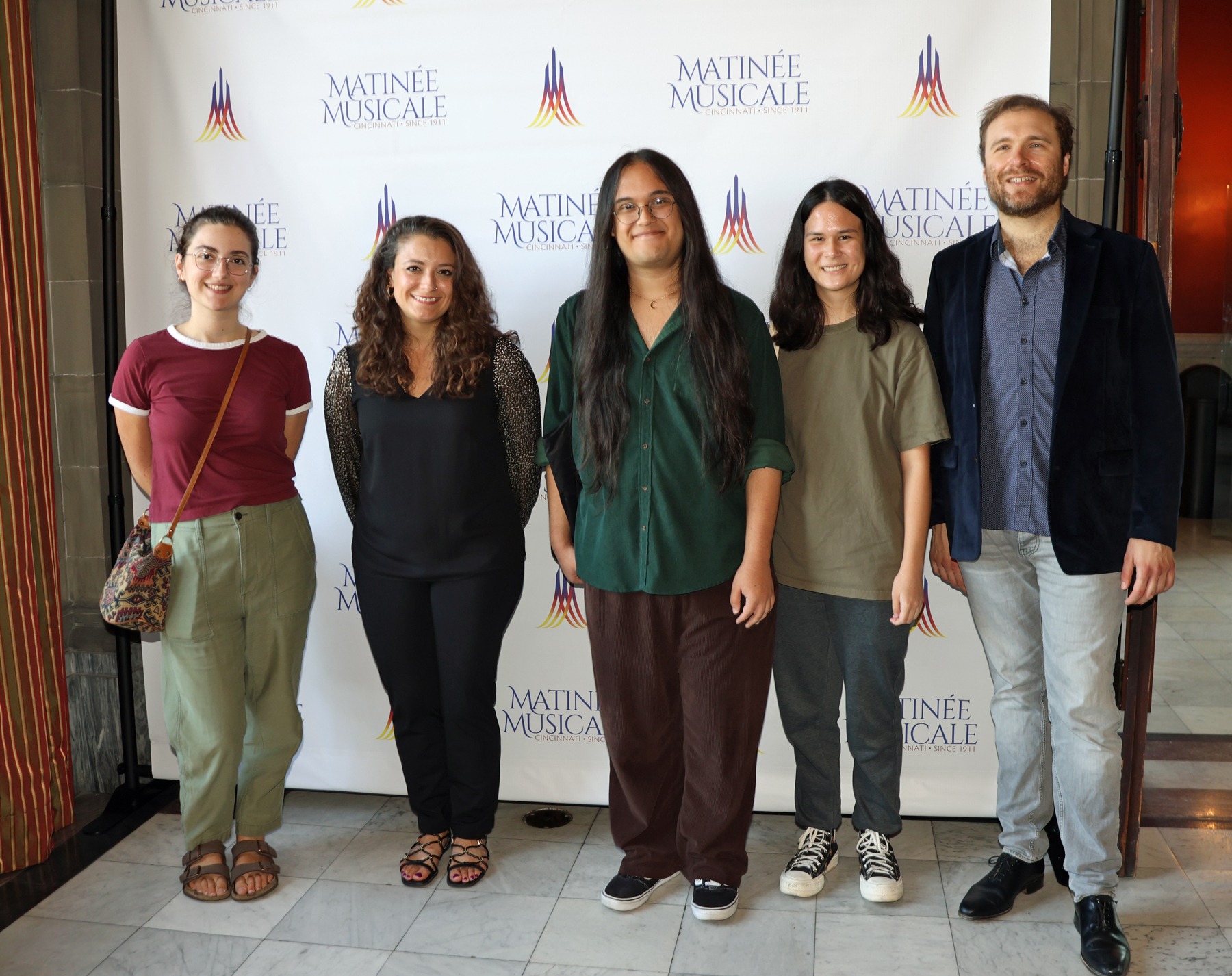 Milena and Adam with some students