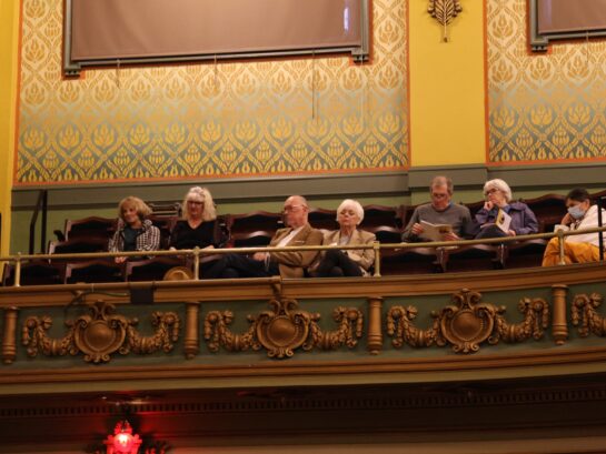 People in the balcony {{brizy_dc_image_alt imageSrc=