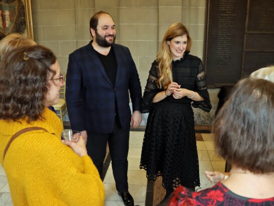 Artists talking to guests at the Reception