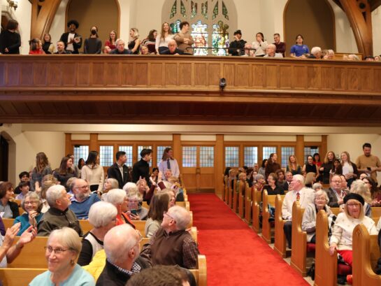 Judy asked all the students in the audience to stand. {{brizy_dc_image_alt imageSrc=