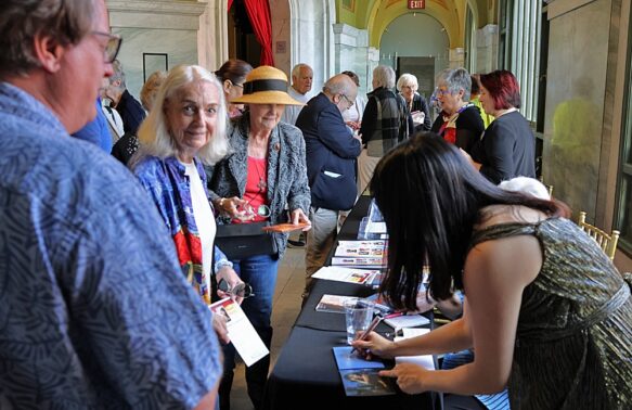 Claire Huangci, pianist, signs CDs at Intermission {{brizy_dc_image_alt imageSrc=