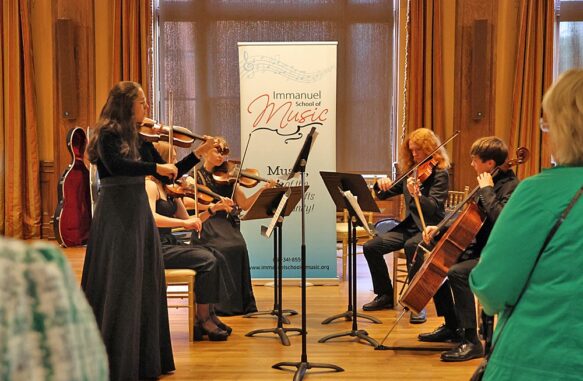 Students from Immanuel School of Music performed at the reception {{brizy_dc_image_alt imageSrc=