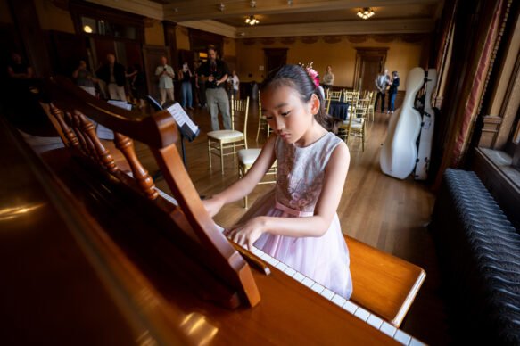 Girl played piano at the reception Girl played piano at the reception