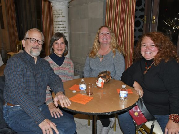 Happy audience members at the reception